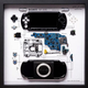 A photo of a disassembled PSP console artfully framed by Grid Studio.